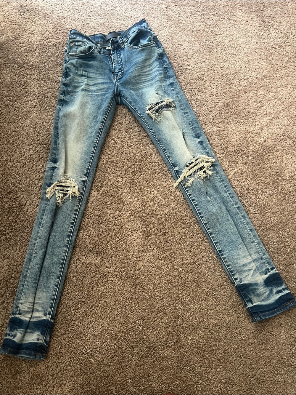 Amiri Light Blue Distressed Skinny Jeans - Ripped Knee Detail in